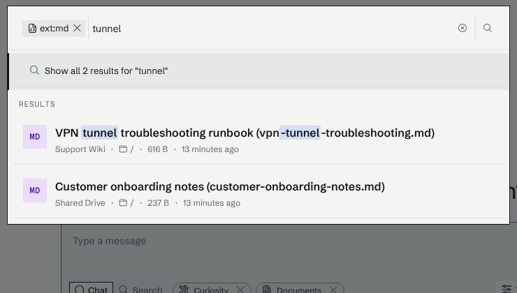The search box with an ext:md chip and the text "tunnel" typed, listing two Markdown files in the quick results.